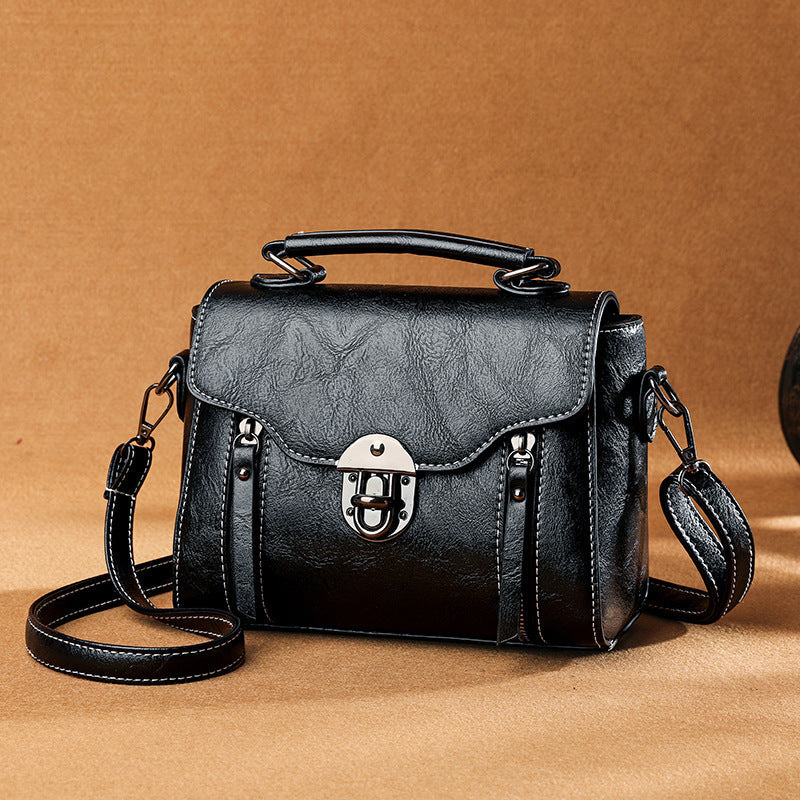 Layar - sac à main carré en cuir Noir