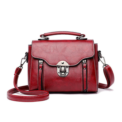 Layar - sac à main carré en cuir Rouge