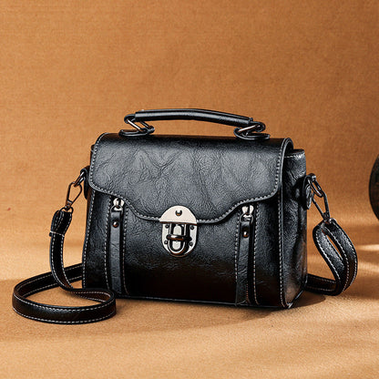 Layar - sac à main carré en cuir Noir